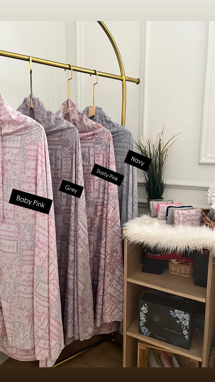 Mukena Slim Genggam Corak Etnik